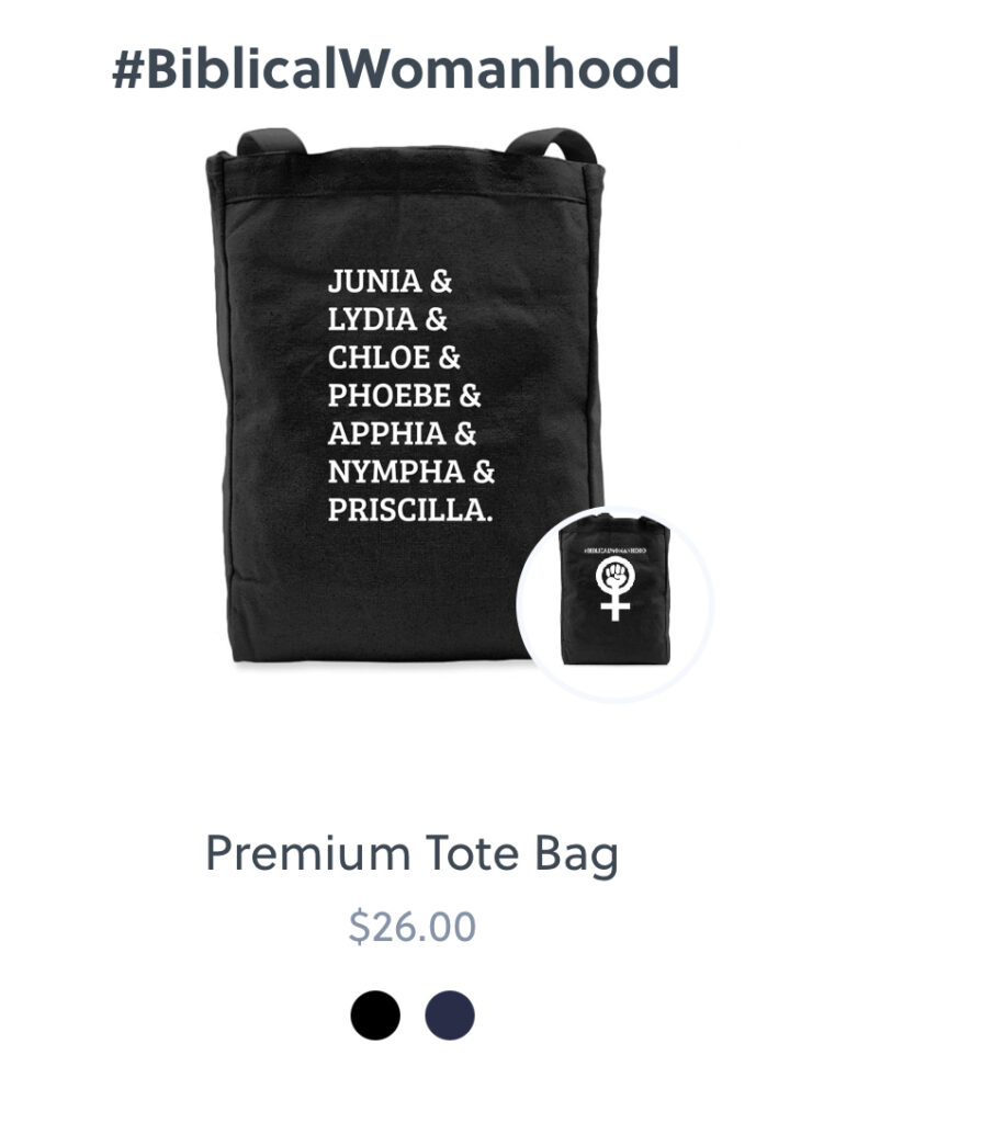 A tote bag from the Words to Spare merch store lists women who were church planters, leaders, deacons, and apostles. The reverse says # Biblical Womanhood with the feminist icon.